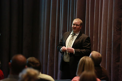 Scott Potter presenting in front of an audience