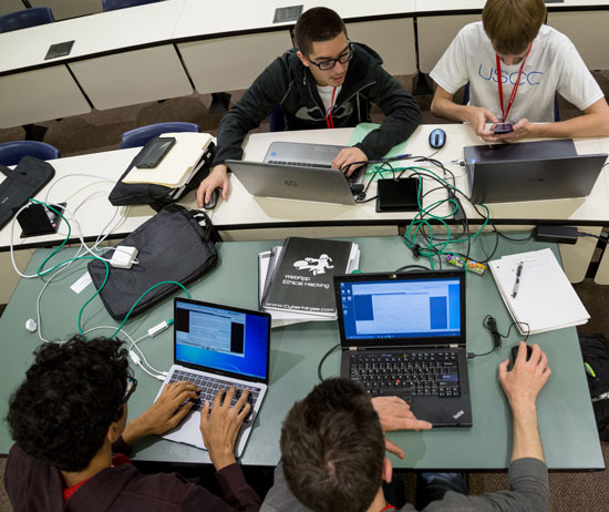 Students working together on their computers