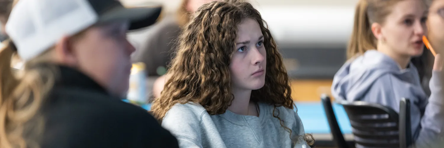 Student listening to a lecture.