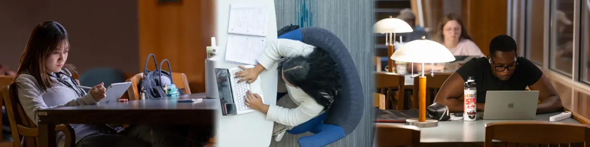 Man working on laptop at a table.
