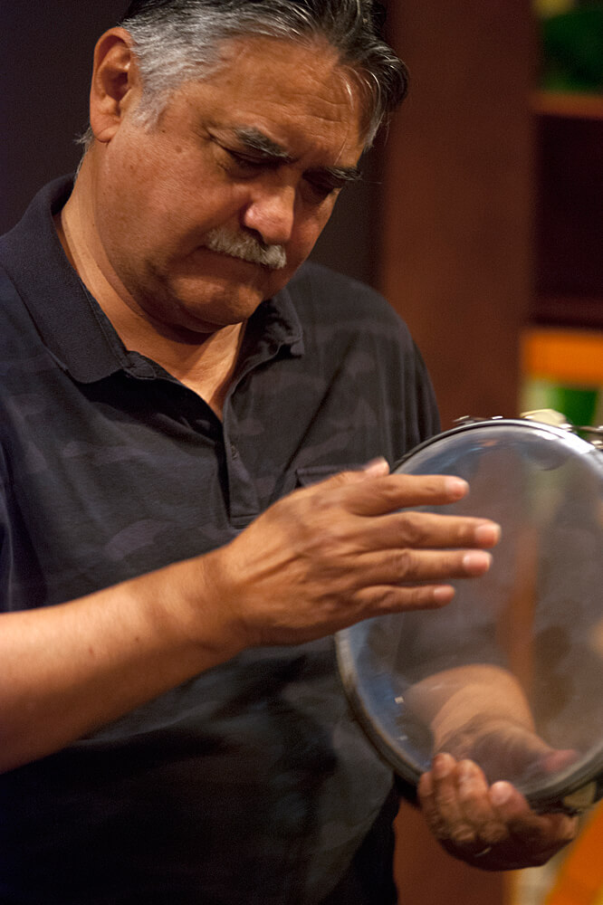 Close-up of Glen Velez and a tambourine 2