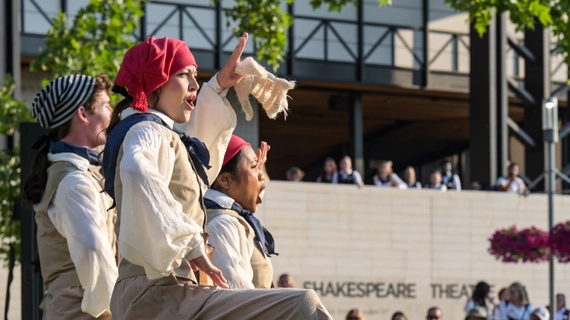 From left, Austin Fronk, Taya Christiansen, and Mikki Pagdonsolan as Featured Performers in the Utah Shakespeare Festival's 2025 production of "The Greenshow." (Photo by Karl Hugh. Copyright Utah Shakespeare Festival 2025.)