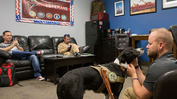 Veteran Center staff and service dog