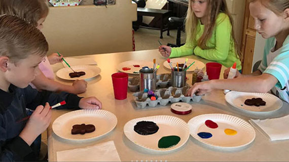 Kindergarten students painting