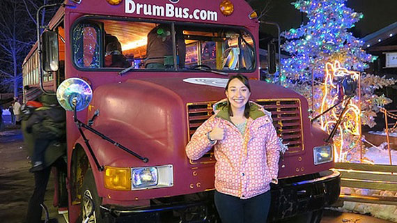 Marissa Brown in front of Drum Bus