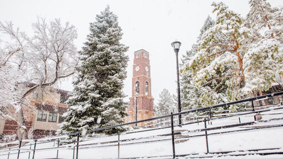 Bell tower on snowy campus