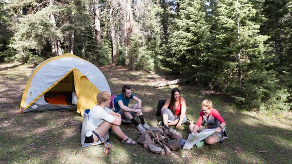 friends outside tent at navajo lake