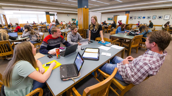 students studying on the third floor of the library
