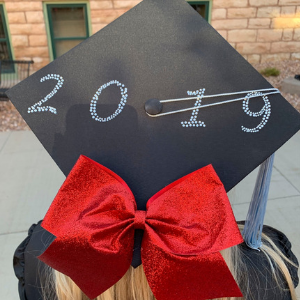 2019 bedazzled and ribbon on back of cap