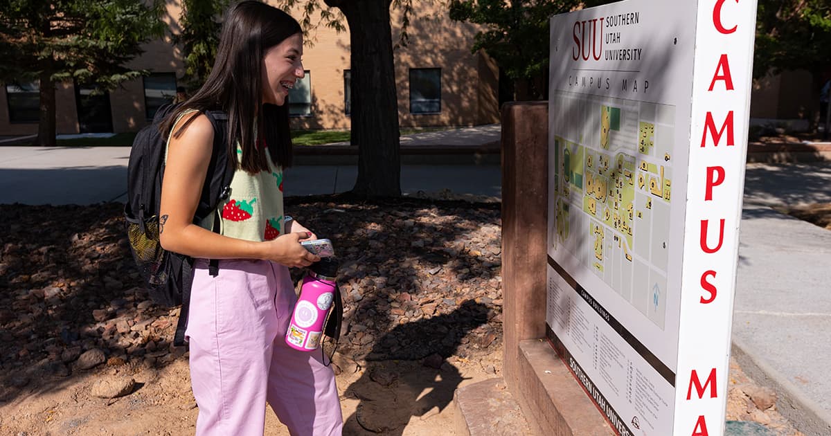 SUU student looks at a campus map.