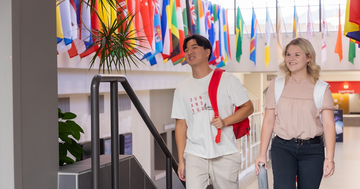 International students walk together through the student center.