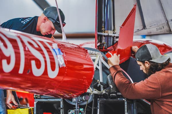 SUU Aviation Technician student repairing the engine in class