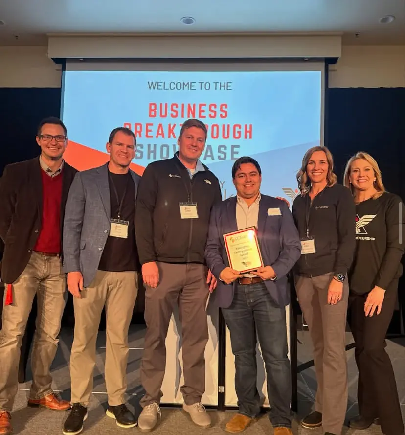 emerging entrepreneur award winner receiving award