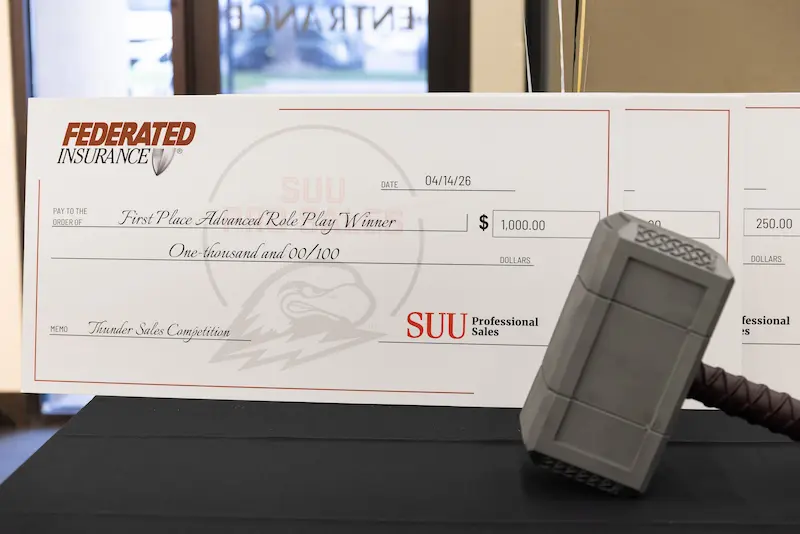 Giant checks for competition winners 12
