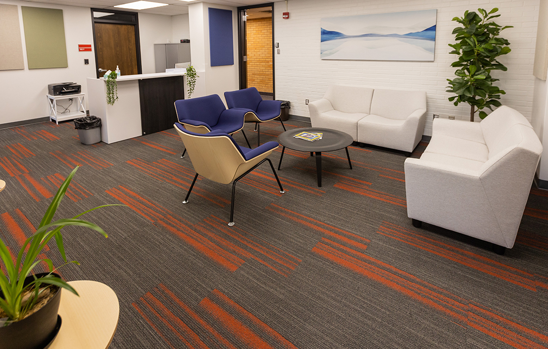 Clinic lobby with armless chairs and sofas