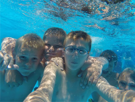 Children swimming underwater