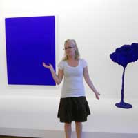 SUU Students in Paris, 2010: Student standing in front of blue artwork