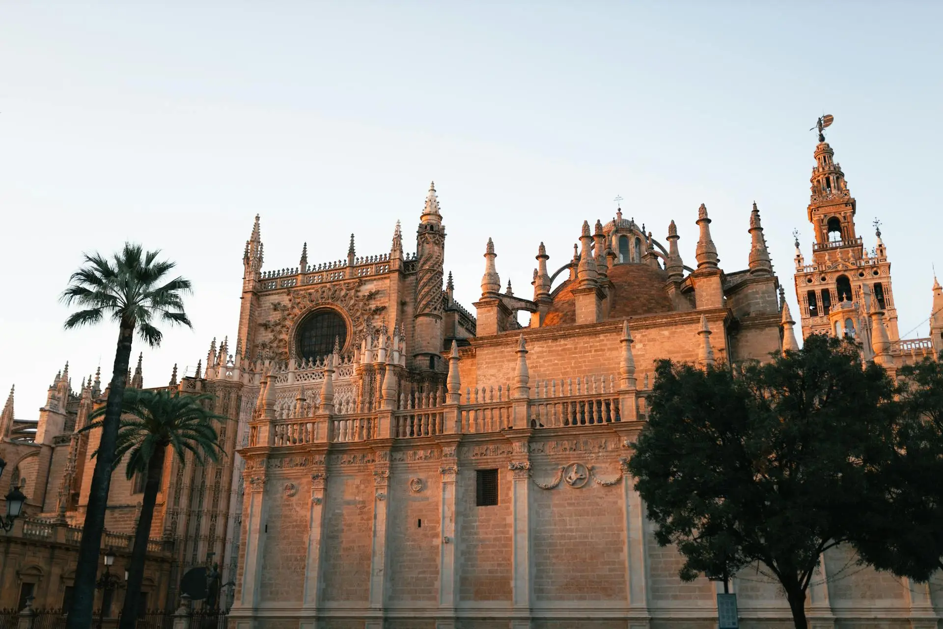 Seville Cathedral with lofty spires and intricate architecture. 5