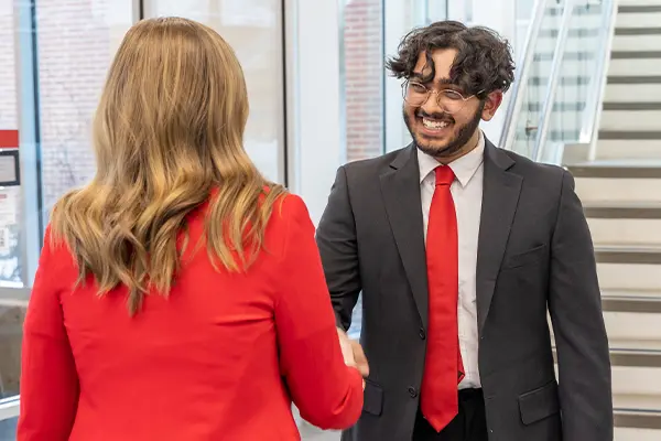 Student meeting with interviewer