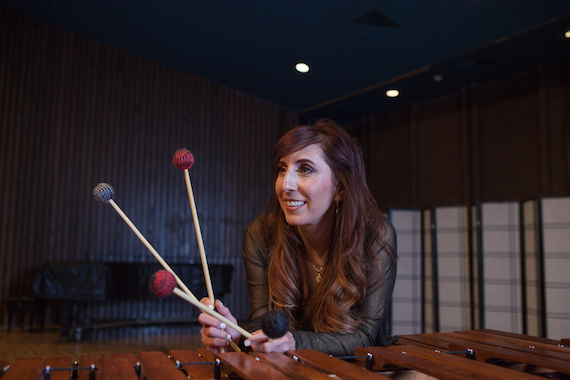 Dr Lynn Vartan in front of xylophone