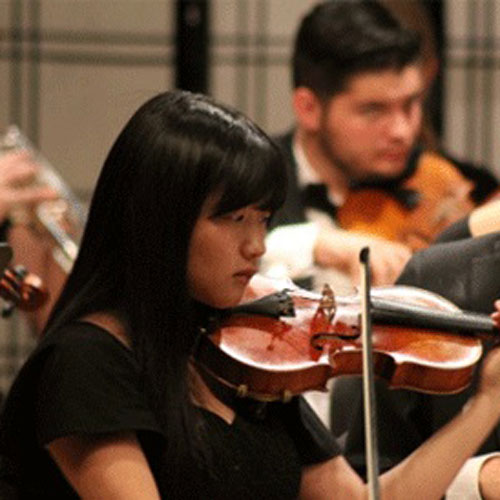 Student performing at orchestra concert