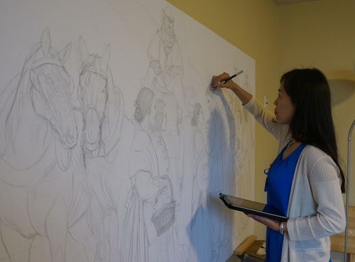 Yidan Guo in the process of sketching her design