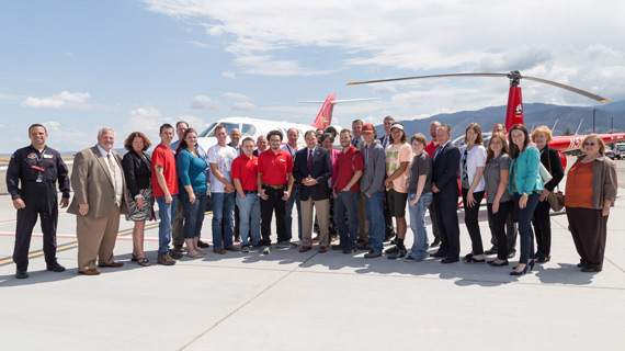 Governor Herbert and students from SUU Aviation and Southwest Tech standing on Cedar City Airport tarmac