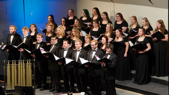 Students performing in an SUU choir concert
