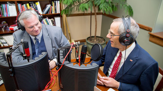 President Scott Wyatt talking to a guest on his podcast