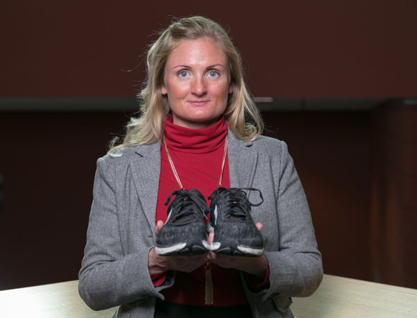 Anthropology professor Liz Olson with her running shoes