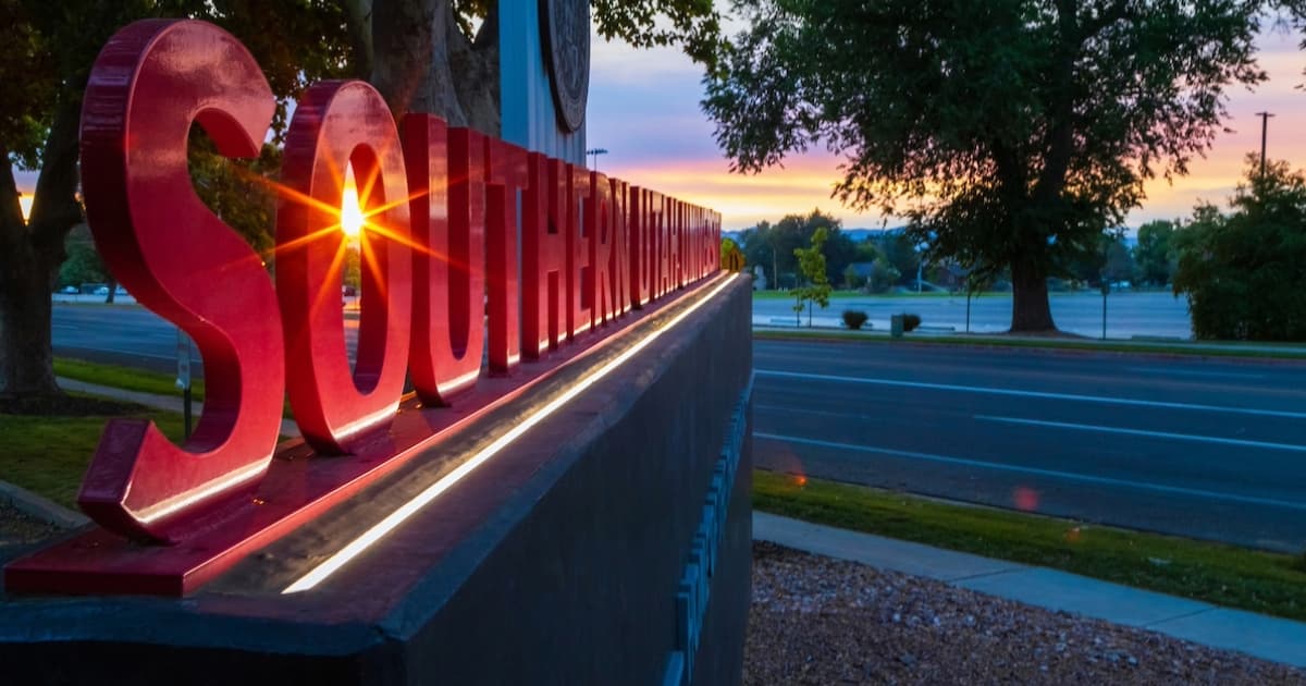 SUU sign up close with a sun flare through the letters