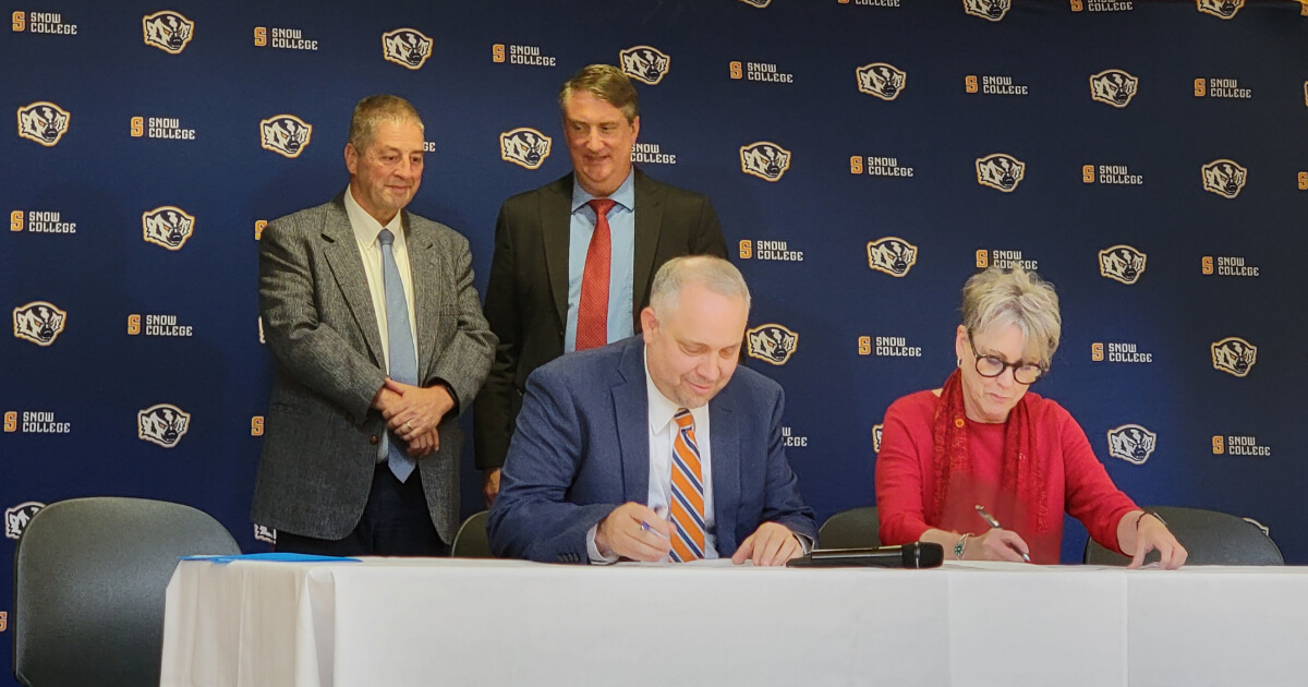 Snow College officials signing agreement