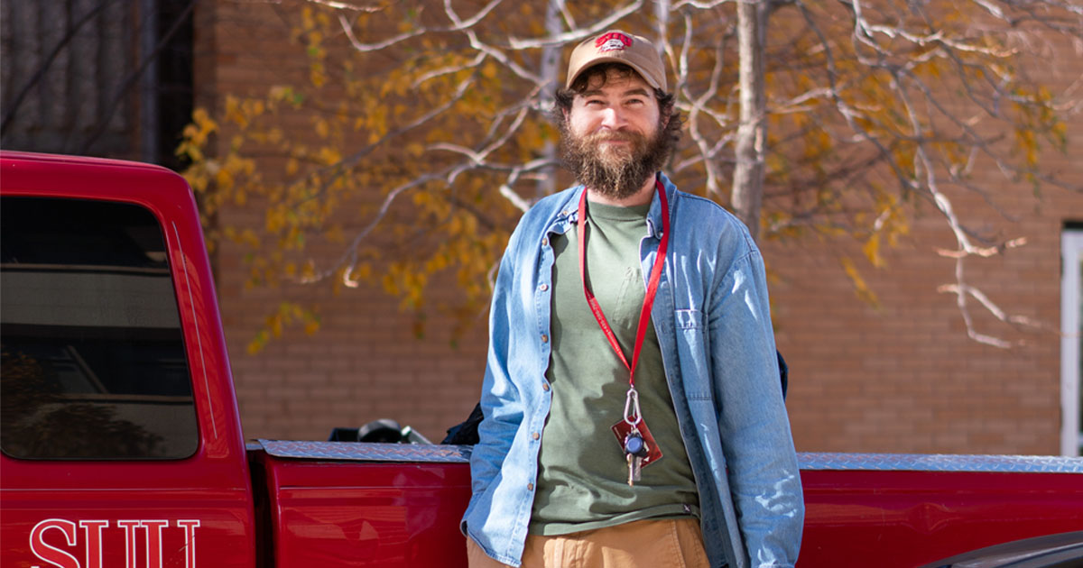 Student with SUU truck