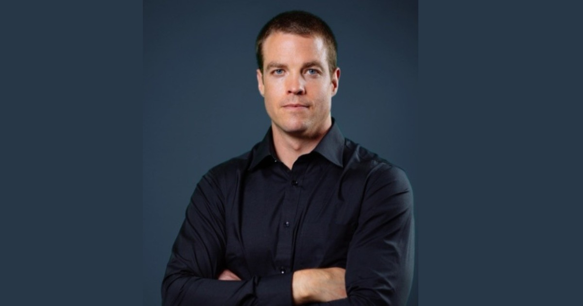 Tyler Lebaron poses for a headshot