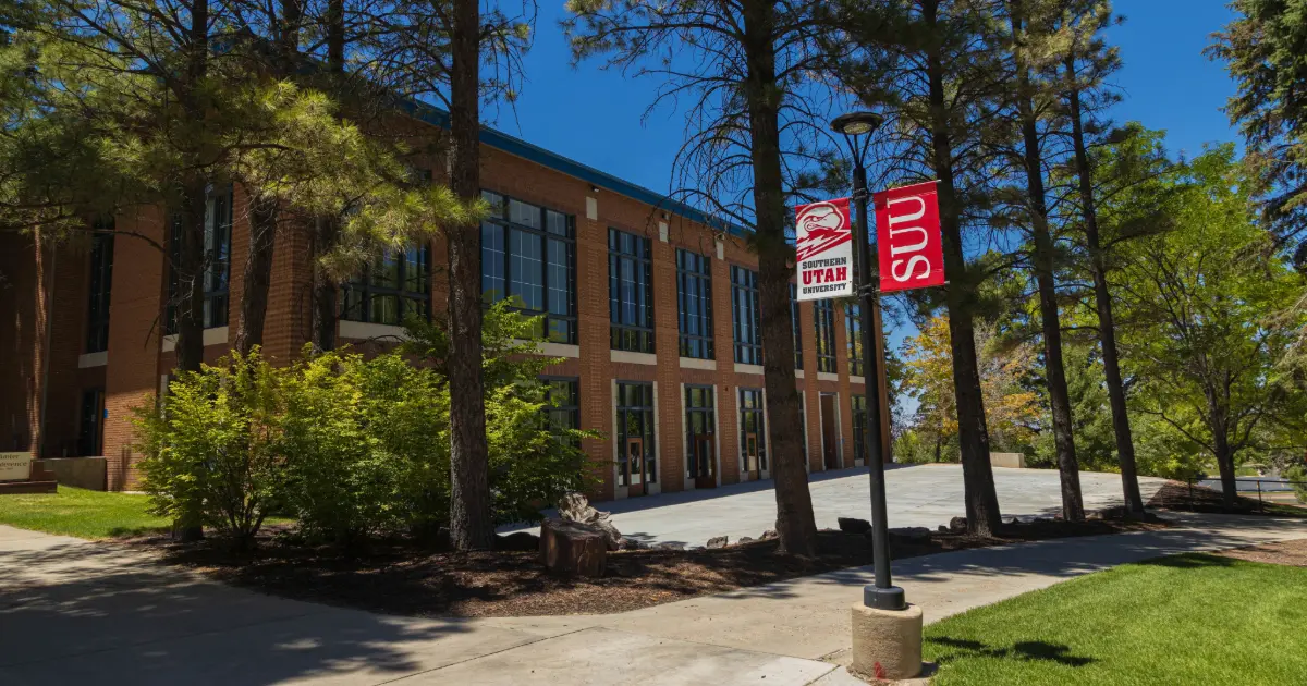Hunter Alumni Conference center building with sky and greenery