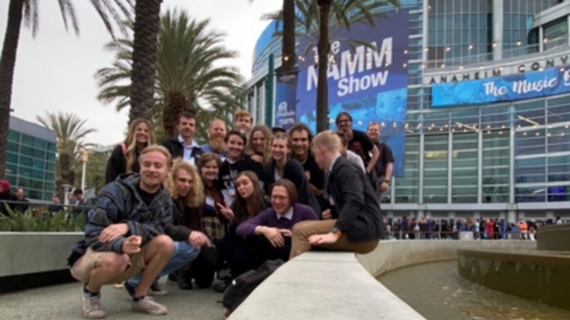 Commercial Music students pose in front of Anaheim Conference Center in spring 2023.