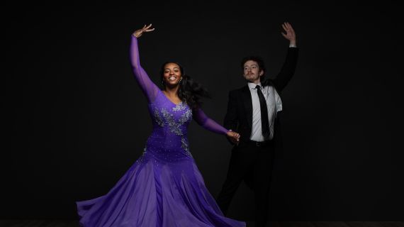 Two SUU Ballroom Company dancers pose.