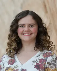Headshot of Annika Faux-Gough.