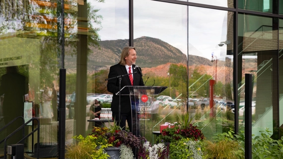 Photo of Dean Michael T. Schmidt addressing the crowd at the Eccles Music Center Ribbon Cutting.