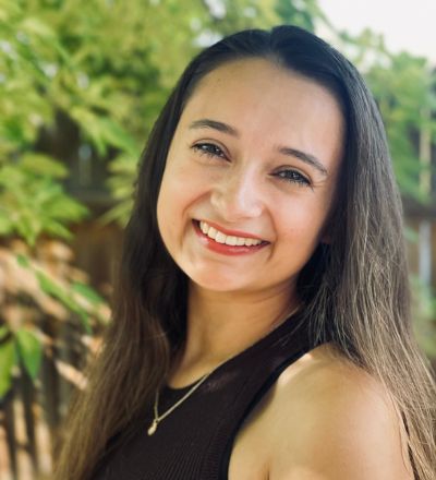 Headshot of Alondra Cordova-Miralli.