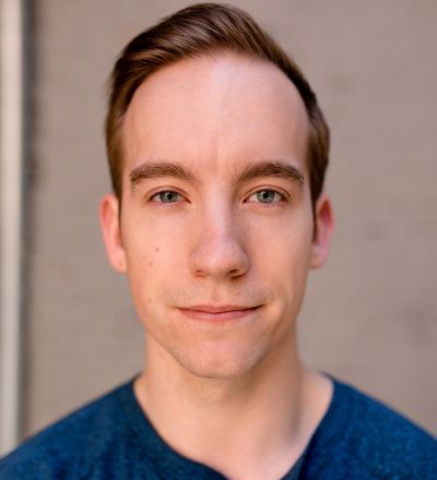 Headshot of Trevor Messenger.