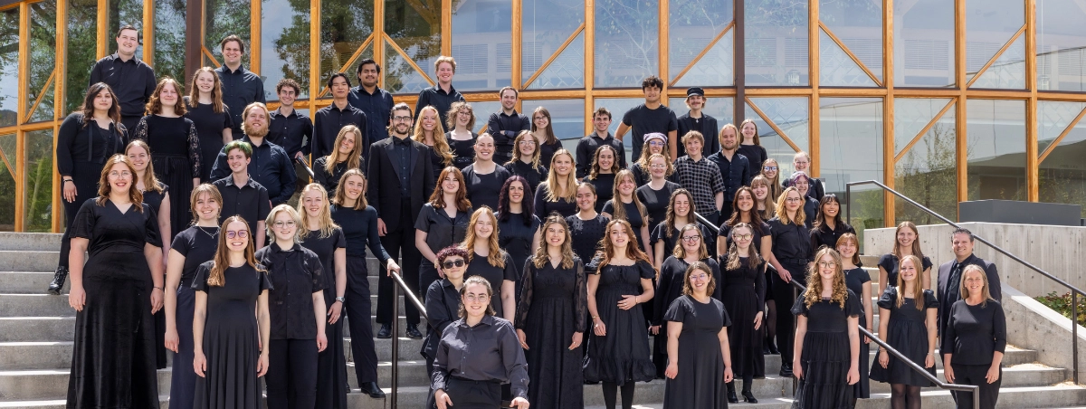 Photo of the Concert Choir outside the Randall L. Jones Theatre. Spring 2026.
