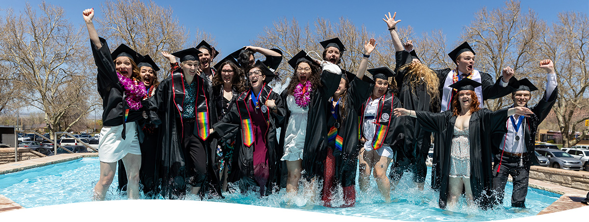 Graduating TDAA students celebrating in the Auditorium fountain.