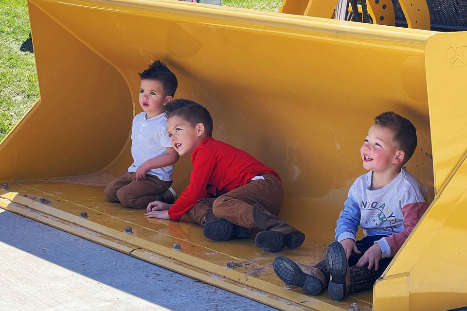 Children sitting in a tractor