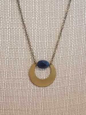 Brass crescent moon necklace with blue stone